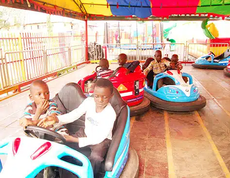 Children enjoying bumper cars supplied by Carnee Rides as the company expanded into the Middle East and South America