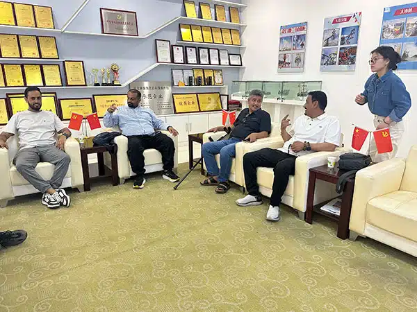 Customers having a business meeting with Carnee Rides team in the honor and awards display room