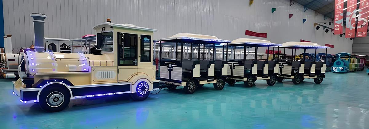 Electric amusement park train ride providing safe and comfortable sightseeing transportation for visitors