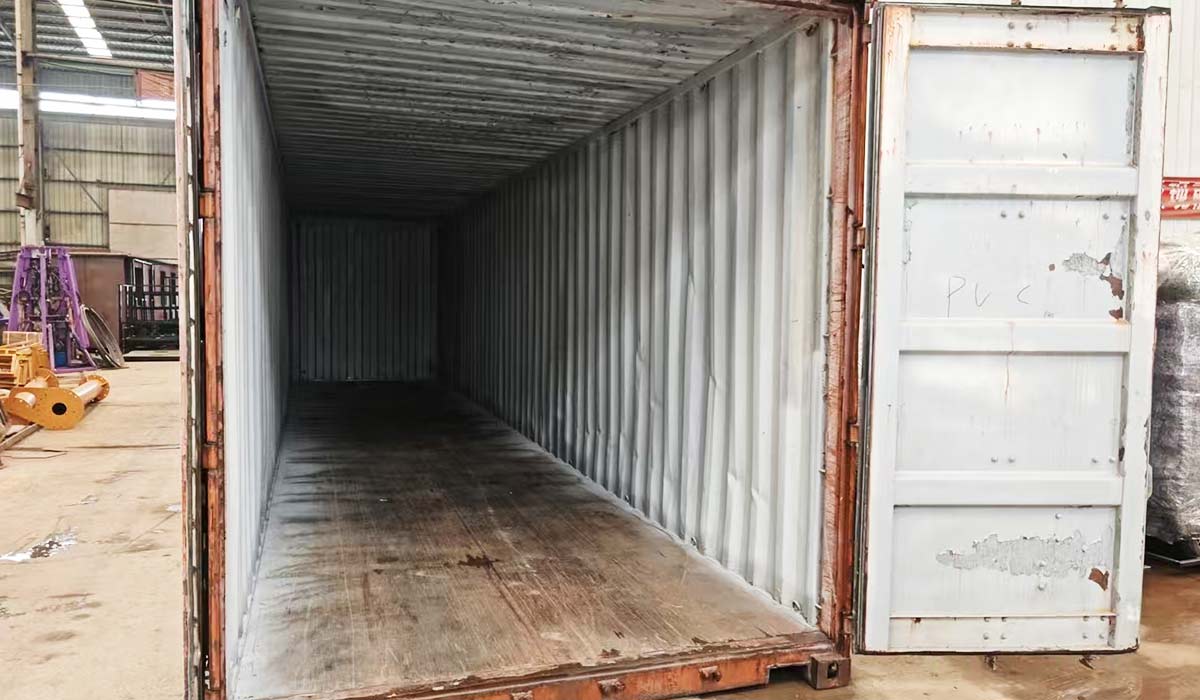 Shipping container prepared for trackless train export showing international freight and delivery cost factor